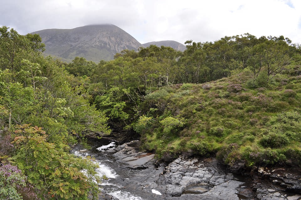 The Red Cuillins from the river flowing down from the slopes of Blaven.